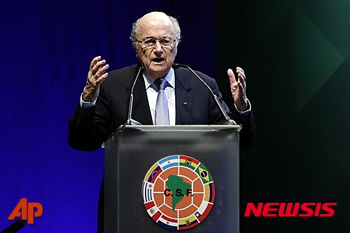 FIFA President Sepp Blatter speaks at a CONMEBOL general congress in Asuncion, Paraguay, Wednesday, March 4, 2015. The 78-year-old Blatter is seeking a fifth, four-year term running football. The countries which make up the South American football confederation have decided to support Blatter in FIFA's presidential elections, a person familiar with the decision told The Associated Press on Tuesday. (AP Photo/Jorge Saenz)