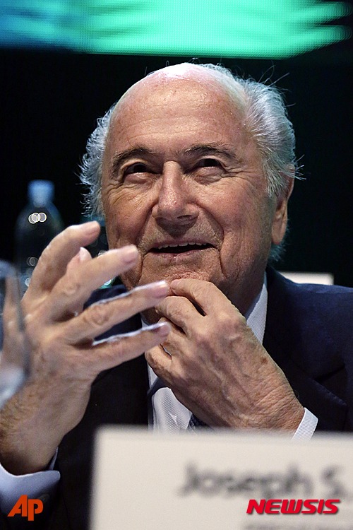 FILE - In this Wednesday, March 4, 2015 file photo, FIFA President Sepp Blatter attends a general Conmebol congress in Asuncion, Paraguay. Sepp Blatter?s widely expected re-election on May 29, 2015 as president of soccer?s world governing body for a fifth term has seldom seemed a real contest. Three rival candidates entered the race in January: Prince Ali bin al-Hussein of Jordan, Luis Figo of Portugal and Michael van Praag of the Netherlands. Van Praag, however, dropped out of the race on Thursday May 21, 2015, and switched his support to FIFA vice president Prince Ali. (AP Photo/Jorge Saenz, File)