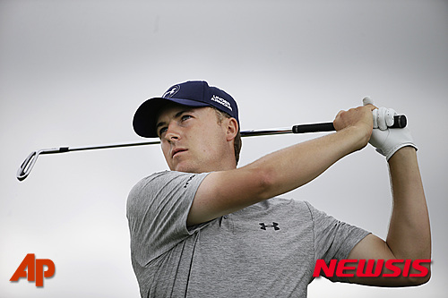 Jordan Spieth watches his tee shot shot on the 13th hole during the second round of the Byron Nelson golf tournament, Friday, May 29, 2015, in Irving, Texas. (AP Photo/LM Otero) 