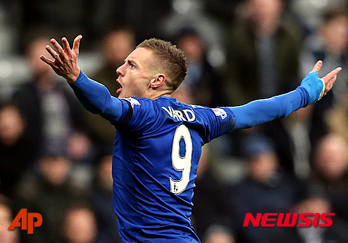FILE - This is a Saturday, Nov. 21, 2015 file photo of Leicester City's Jamie Vardy as he celebrates his goal during the English Premier League soccer match between Newcastle United and Leicester City at St James' Park, Newcastle, England. Jamie Vardy?s unconventional route to the English Premier League?s record book began with heartbreaking rejection at 16 and back-breaking work in a carbon-fiber factory. (AP Photo/Scott Heppell) UNITED KINGDOM OUT NO SALES NO ARCHIVE