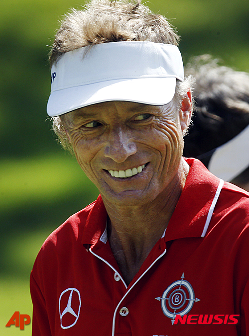 Bernhard Langer, of Germany, smiles as he walks up to the 9th green during the final round of the PGA Regions Tradition at the Greystone Golf & Country Club in Birmingham, Ala., Sunday, May 22, 2016. (Hal Yeager/AL.com via AP) MANDATORY CREDIT