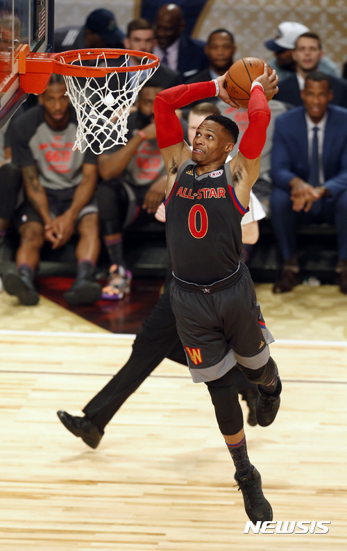 Western Conference guard Russell Westbrook, of the Oklahoma City Thunder, dunks during the first half of the NBA All-Star Game in New Orleans, Sunday, Feb. 19, 2017. (AP Photo/Max Becherer)