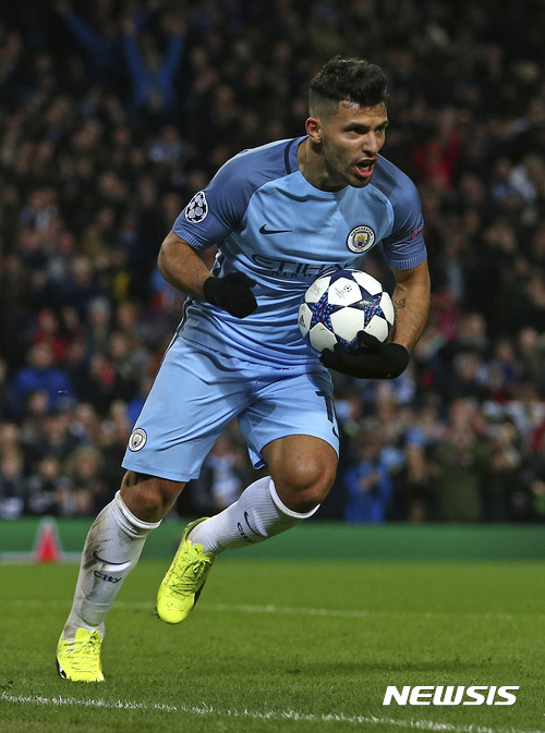 Manchester City's Sergio Aguero celebrates after scoring his side's second goal during the Champions League round of 16 first leg soccer match between Manchester City and Monaco at the Etihad Stadium in Manchester, England, Tuesday Feb. 21, 2017. (AP Photo/Dave Thompson)
