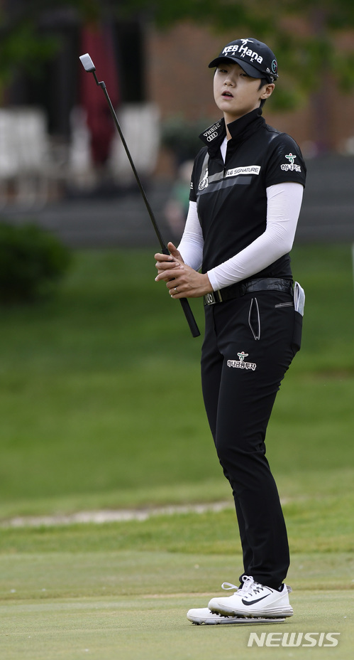 Sung Hyun Park of South Korea reacts after missing a birdie putt on the 17th green during the final round of the LPGA Volvik Championship golf tournament at the Travis Pointe Country Club, Sunday, May 28, 2017 in Ann Arbor, Mich. (AP Photo/Jose Juarez)