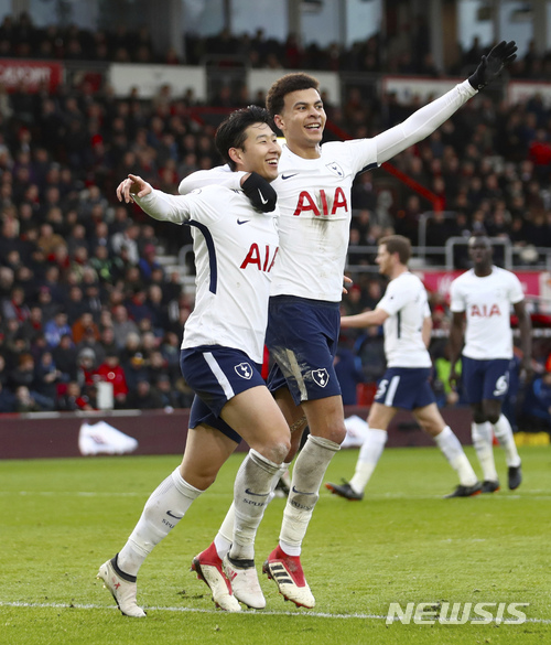 Tottenham Hotspur&#039;s Son Heung-Min, left, celebrates scoring his side&#039;s second goal of the game against Bournemouth with team mate Tottenham Hotspur&#039;s Dele Alli during their English Premier League soccer match at the Vitality Stadium in Bournemouth, Sunday March 11, 2018. (John Walton/PA via AP)