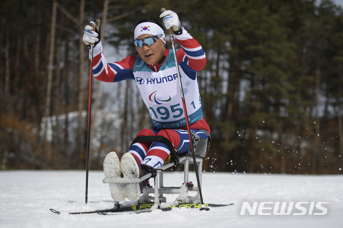 South Korea&#039;s Lee Do-yeon competes during the Cross Country Skiing Women&#039;s Sitting 5km at the Alpensia Biathlon Centre, the Paralympic Winter Games, Daengwallyeong-myeon, South Korea, Saturday, March 17, 2018. (Thomas Lovelock/OIS/IOC via AP)