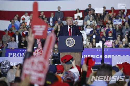 President Donald Trump speaks at a rally at Total Sports Park Saturday, April 28, 2018, in Washington, Mich. (AP Photo/Pablo Martinez Monsivais) 