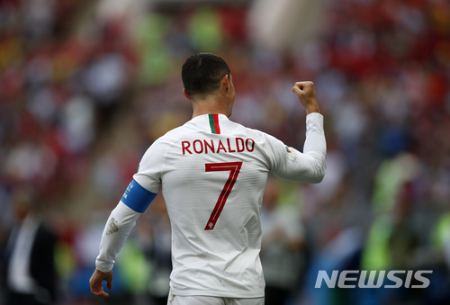 Portugal&#039;s Cristiano Ronaldo celebrates after scoring the opening goal during the group B match between Portugal and Morocco at the 2018 soccer World Cup in the Luzhniki Stadium in Moscow, Russia, Wednesday, June 20, 2018. (AP Photo/Francisco Seco)