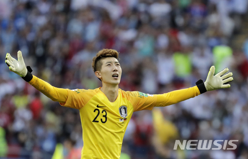 South Korea goalkeeper Jo Hyun-woo celebrates the opening goal during the group F match between South Korea and Germany, at the 2018 soccer World Cup in the Kazan Arena in Kazan, Russia, Wednesday, June 27, 2018. (AP Photo/Lee Jin-man)