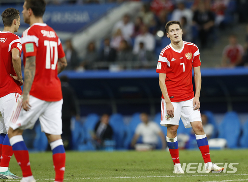 Russia&#039;s Daler Kuziaev, right, reacts after missing his side&#039;s second goal during the quarterfinal match between Russia and Croatia at the 2018 soccer World Cup in the Fisht Stadium, in Sochi, Russia, Saturday, July 7, 2018. (AP Photo/Darko Bandic)