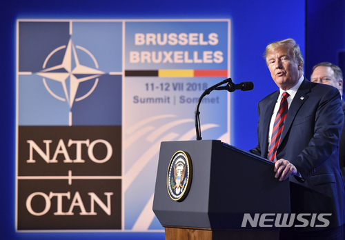 U.S. President Donald Trump speaks during a press conference during a summit of heads of state and government at NATO headquarters in Brussels, Belgium, Thursday, July 12, 2018. NATO leaders gather in Brussels for a two-day summit. (AP Photo/Geert Vanden Wijngaert)