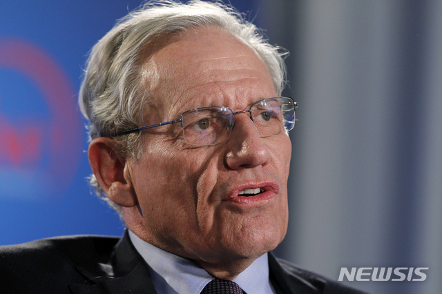 FILE - This June 11, 2012 file photo shows former Washington Post reporter Bob Woodward speaking during an event to commemorate the 40th anniversary of Watergate in Washington. Woodward says top staffers in President Donald Trump’s administration “are not telling the truth” when they deny incendiary quotes about Trump attributed to them in his new book. (AP Photo/Alex Brandon, file)