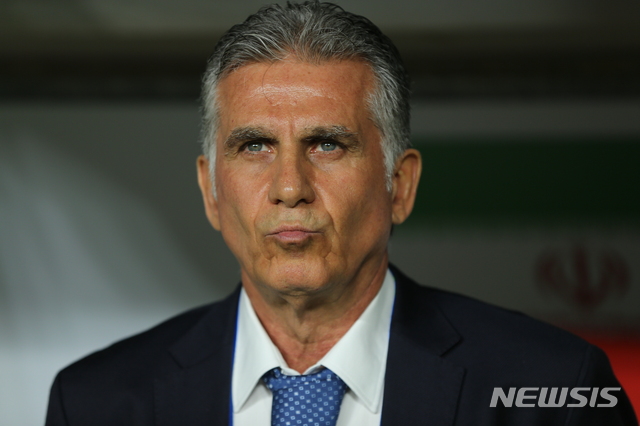 Iran&#039;s head coach Carlos Queiroz attends the AFC Asian Cup round of 16 soccer match between Iran and Oman at Mohammed Bin Zayed Stadium in Abu Dhabi, United Arab Emirates, Sunday, Jan. 20, 2019. (AP Photo/Kamran Jebreili)