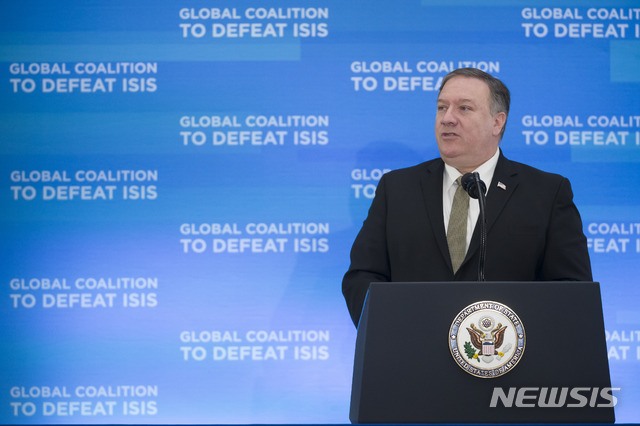 Secretary of State Mike Pompeo gives opening remarks during the Global Coalition to Defeat ISIS meeting, at the State Department, Wednesday, Feb. 6, 2019, in Washington. (AP Photo/Alex Brandon)