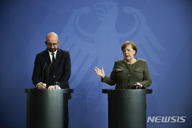 German Chancellor Angela Merkel, right, and the Prime Minister of Belgium Charles Michel, left, brief the media after a meeting at the chancellery in Berlin, Tuesday, March 12, 2019. (Photo/Markus Schreiber)
