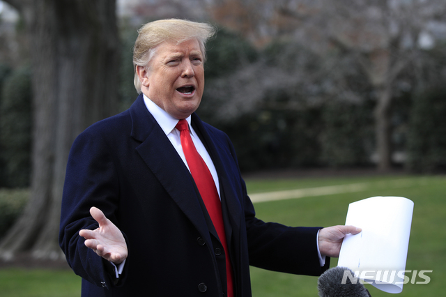 President Donald Trump speaks to reporters before departing the White House, Wednesday, March 20, 2019, in Washington, for a trip to visit an Army tank plant in Lima, Ohio, and a fundraising event in Canton, Ohio. (AP Photo/Manuel Balce Ceneta)