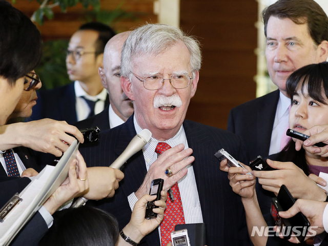 In this Friday, May 24, 2019, photo, U.S. National Security Adviser John Bolton is surrounded by reporters at the prime minister&#039;s official residence in Tokyo. Bolton called a series of short-range missiles launched by North Korea last month were violations to U.N. Security Council resolutions, stressing the need to keep sanctions in place. Bolton said Saturday, May 25, 2019, in Tokyo the U.S. position on the North’s denuclearization is consistent and that a repeated pattern of failures should be stopped. (Yohei Kanasashi/Kyodo News via AP)