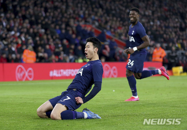 Tottenham Hotspur&#039;s Son Heung-min celebrates scoring his side&#039;s first goal of the game during the FA Cup fourth round soccer match between Southampton and Tottenham Hotspur at St Mary&#039;s Stadium, Southampton, England. Saturday, Jan. 25, 2020. (Steven Paston/PA via AP)