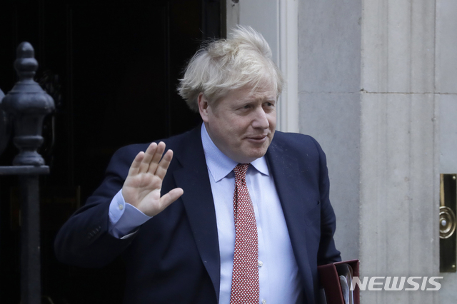 FILE - In this Wednesday, March 25, 2020 file photo Britain&#039;s Prime Minister Boris Johnson leaves 10 Downing Street for the House of Commons for his weekly Prime Ministers Questions, in London. British Prime Minister Boris Johnson has tested positive for the new coronavirus. Johnson&#039;s office said Friday March 27, 2020 that he was tested after showing mild symptoms, Downing St. says Johnson is self-isolating and continuing to lead the country&#039;s response to COVID-19. (AP Photo/Matt Dunham, File)