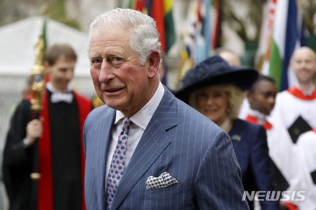 FILE - In this Monday, March 9, 2020 file photo, Britain&#039;s Prince Charles and Camilla the Duchess of Cornwall, in the background, leave after attending the annual Commonwealth Day service at Westminster Abbey in London. Prince Charles has warned that up to 1 million young people may need “urgent help’’ to protect their futures from the ravages of the COVID-19 pandemic, it was reported on Sunday, Sept. 27, 2020. Writing in the Sunday Telegraph, the Prince of Wales said the crisis is reminiscent of the upheavals of the 1970s, when youth unemployment was one of the pressing issues facing British society. (AP Photo/Kirsty Wigglesworth, File)