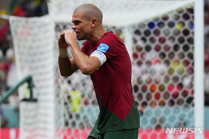 Portugal's Pepe celebrates after scoring a goal during the World Cup round of 16 soccer match between Portugal and Switzerland, at the Lusail Stadium in Lusail, Qatar, Tuesday, Dec. 6, 2022. (AP Photo/Natacha Pisarenko)