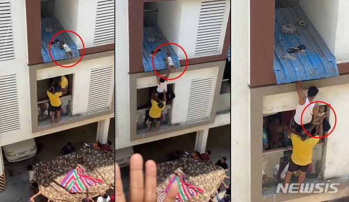 인도의 한 아파트 4층에서 떨어진 아이가 2층 차양에 착지해 위태롭게 매달려 있다가 구조되는 사건이 발생했다. 아찔한 구조 영상은 소셜미디어(SNS)에 올라와 화제가 됐다. 출처 : @RengarajMr *재판매 및 DB 금지