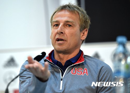FILE - In this June 9, 2015, file photo, U.S. head coach Juergen Klinsmann talks to the media during a news conference in Cologne, Germany. Klinsmann was fired as coach of the U.S. soccer team on Monday, Nov. 21, 2016, six days after a 4-0 loss at Costa Rica dropped the Americans to 0-2 in the final round of World Cup qualifying. (AP Photo/Martin Meissner, File)