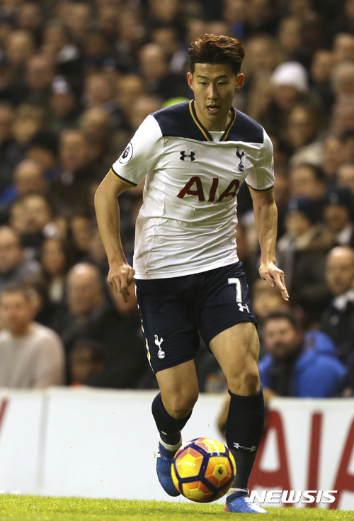Tottenham Hotspur's Son Heung-min runs with the ball during the English Premier League soccer match between Tottenham Hotspur and Middlesbrough at White Hart Lane stadium in London, Saturday, Feb. 4, 2017. (AP Photo/Joel Ryan)