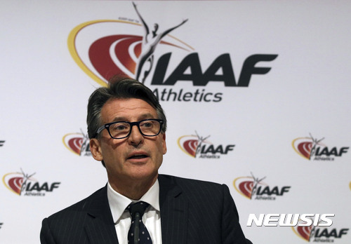 FILE - In this June 17, 2016 file photo, IAAF President Sebastian Coe speaks during a news conference after a meeting of the IAAF Council at the Grand Hotel in Vienna, Austria. The IAAF is upholding its global ban on Russian athletes and freezing all nationality switches. Following a council meeting in Monaco on Monday, Feb. 6, 2017, Coe said Russian athletics should not expect “full reinstatement” before November. (AP Photo/Ronald Zak, File)