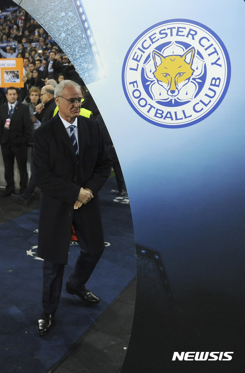 FILE - In this Wednesday, Dec. 7, 2016 file photo Leicester City manager Claudio Ranieri enters the pitch for a Champions League group G soccer match between FC Porto and Leicester City at the Dragao stadium in Porto, Portugal. Leicester City announced Thursday, Feb. 23, 2017 that they have sacked manager Claudio Ranieri less than a year after their incredible run to the Premier League title. (AP Photo/Paulo Duarte, File)