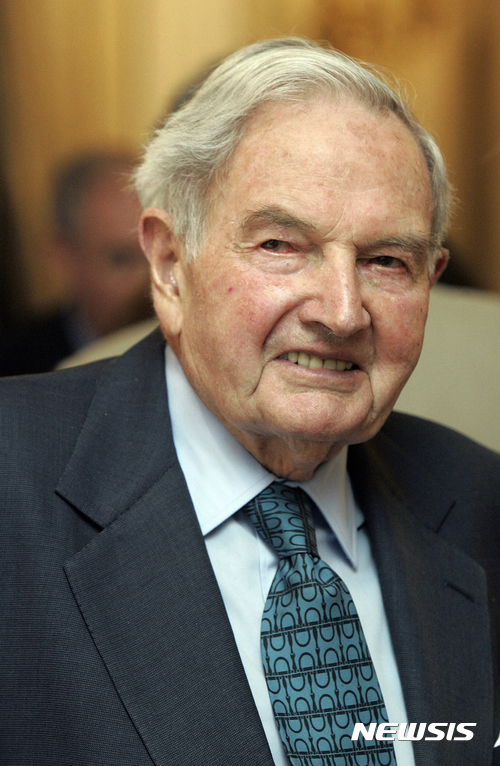 FILE - In this May 15, 2007, file photo, David Rockefeller participates in the C40 Large Cities Climate Summit in New York. The billionaire philanthropist who was the last of his generation in the famously philanthropic Rockefeller family died Monday, March 20, 2017, according to a family spokesman. He was 101 years old. (AP Photo/Richard Drew, File)