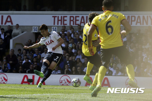 Tottenham's Son Heung-Min, left, scores a goal during the English Premier League soccer match between Tottenham Hotspur and Watford at White Hart Lane in London, Saturday April 8, 2017. (AP Photo/Tim Ireland)