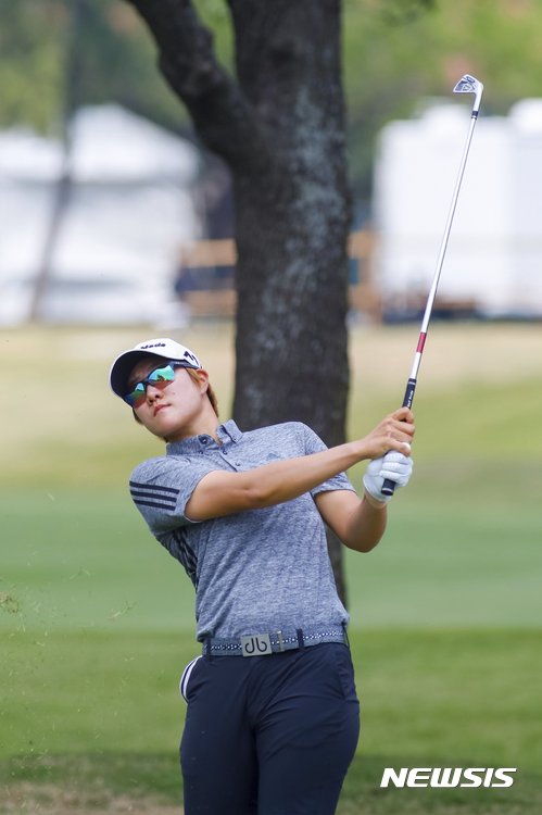 Eun Jeong Seong hits her second shot on the 10th hole during the third round of the LPGA golf tournament, Saturday, April 29, 2017, at Las Colinas Country Club in Irving, Texas. (Ray Carlin/Star-Telegram via AP)