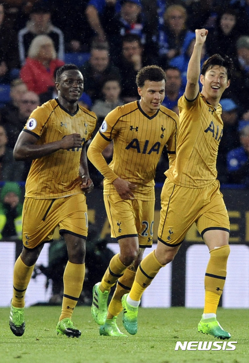 Tottenham's Son Heung-min, right, celebrates after scoring during the English Premier League soccer match between Leicester City and Tottenham Hotspur at the King Power Stadium in Leicester, England, Thursday, May 18, 2017. (AP Photo/Rui Vieira)