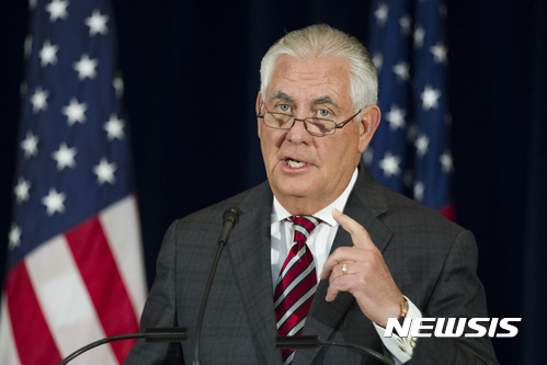 FILE - In this June 21, 2017 file photo, Secretary of State Rex Tillerson speaks at the State Department in Washington. The Trump administration is poised to declare China among the world’s worst offenders on human trafficking, U.S. officials said Monday, June 26, 2017, putting the world’s most populous country in the same category as North Korea, Zimbabwe and Syria, China’s downgrade is to be announced Tuesday, June 27, 2017, at the State Department when Tillerson unveils the annual Trafficking in Persons Report to Congress. (AP Photo/Cliff Owen, File)