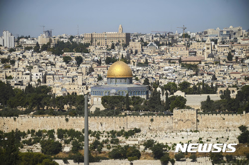 The Dome of the Rock Mosque in the Al Aqsa Mosque compound is seen in Jerusalem's Old City Saturday, July 15, 2017. On Friday, three Palestinian assailants opened fire from a sacred site known to Muslims as the Noble Sanctuary and to Jews as the Temple Mount, inside the walled Old City, killing two Israeli police officers before being shot dead. (AP Photo/Mahmoud Illean) 