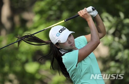 In-Kyung Kim, of South Korea, drives off the 10th tee during the third round of the LPGA Volvik Championship golf tournament at the Travis Pointe Country Club Saturday, May 26, 2018, in Ann Arbor, Mich. (AP Photo/Carlos Osorio)