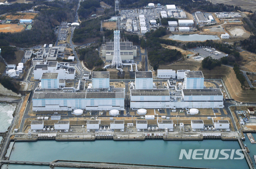 【나라하=교도통신·AP/뉴시스】일본 도쿄(東京)전력은 14일 후쿠시마(福島)현에 위치한 후쿠시마 제2원자력발전소 폐로 방침을 밝혔다. 도쿄전력이 후쿠시마 제2원전의 폐로 방침을 표명하기는 이번이 처음으로, 폐로 대상은 원자로 4기 전체다. 사진은 후쿠시마현 나라하에 있는 제2원전 모습. 2018.06.14 