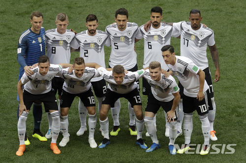 The German team poses for a team photo prior to the group F match between Germany and Mexico at the 2018 soccer World Cup in the Luzhniki Stadium in Moscow, Russia, Sunday, June 17, 2018. (AP Photo/Michael Probst)