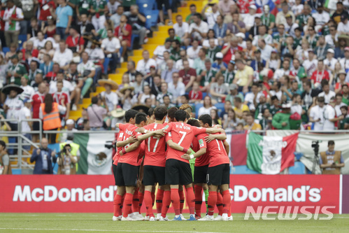 South Korea players embrace before the start of the group F match between Mexico and South Korea at the 2018 soccer World Cup in the Rostov Arena in Rostov-on-Don, Russia, Saturday, June 23, 2018. (AP Photo/Lee Jin-man)