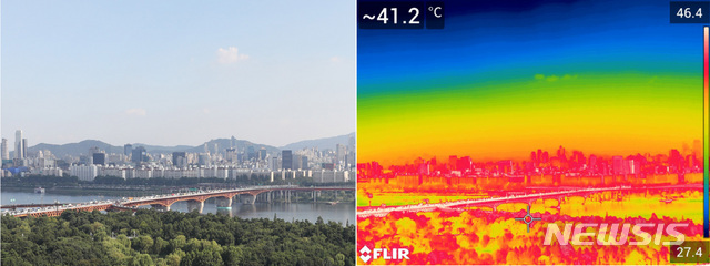 【서울=뉴시스】이영환 기자 = 서울의 낮 최고기온이 39도를 넘어서며 기상 관측 이래 111년 만에 가장 더운 날씨를 보인 1일 오후 서울 성동구 응봉산에서 성수대교 일대가 보이고 있다.오른쪽 사진은 FLIR 열화상카메라로 촬영한 모습으로 성수대교 일대가 붉게 표시되고 있다. 2018.08.01. 20hwan@newsis.com