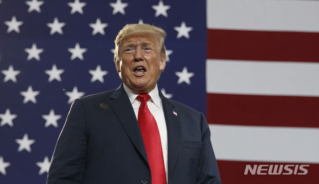 FILE - In this Saturday, Aug. 4, 2018 file photo, President Donald Trump speaks at a rally at Olentangy Orange High School in Lewis Center, Ohio. Showtime will air a new documentary series from award-winning filmmaker Alex Gibney examining the history of clashes between U.S. presidents and the FBI. The four-part series inspired by the book &quot;Enemies: A History of the FBI&quot; by Tim Weiner will debut Nov. 18, 2018, Showtime Networks chief David Nevins told TV critics&#039; Monday, Aug. 6. (AP Photo/Carolyn Kaster, File)