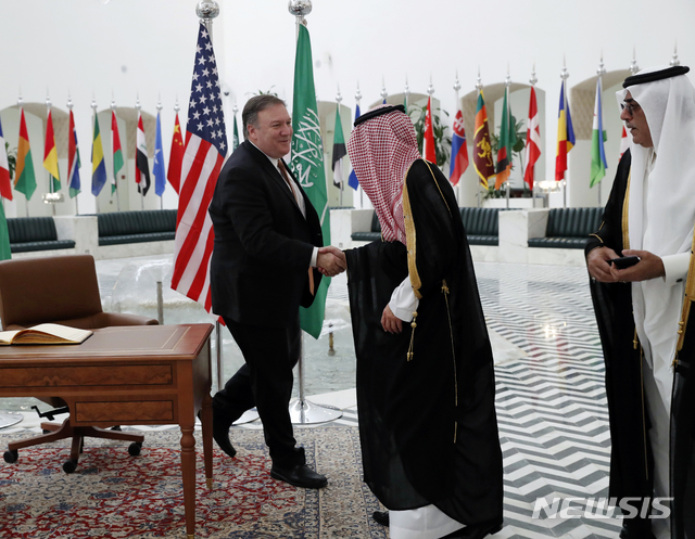 U.S. Secretary of State Mike Pompeo, left, shakes hands with Saudi Foreign Minister Adel al-Jubeir in Riyadh, Saudi Arabia, Tuesday Oct. 16, 2018. U.S. Secretary of State Mike Pompeo met on Tuesday with Saudi Arabia&#039;s King Salman over the disappearance and alleged slaying of Saudi writer Jamal Khashoggi, who vanished two weeks ago during a visit to the Saudi Consulate in Istanbul. (Leah Millis/Pool via AP)
