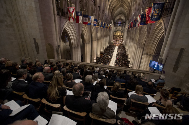 The State Funeral for former President George H.W. Bush at the National Cathedral, Wednesday, Dec. 5, 2018, in Washington. (AP Photo/Andrew Harnik, Pool)