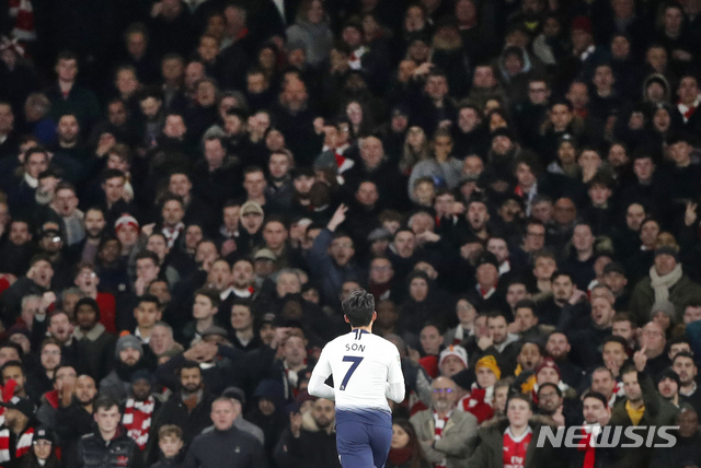 Tottenham&#039;s Son Heung-min celebrates after scoring his side&#039;s first goal during the English League Cup quarter final soccer match between Arsenal and Tottenham Hotspur at the Emirates stadium in London, Wednesday, Dec. 19, 2018. (AP Photo/Frank Augstein)