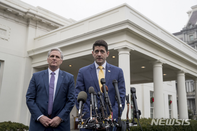 House Speaker Paul Ryan of Wis., right, accompanied by House Majority Leader Kevin McCarthy of Calif. speak to reporters outside the West Wing of the White House in Washington, Thursday, Dec. 20, 2018, following a meeting with President Donald Trump on border security. (AP Photo/Andrew Harnik)