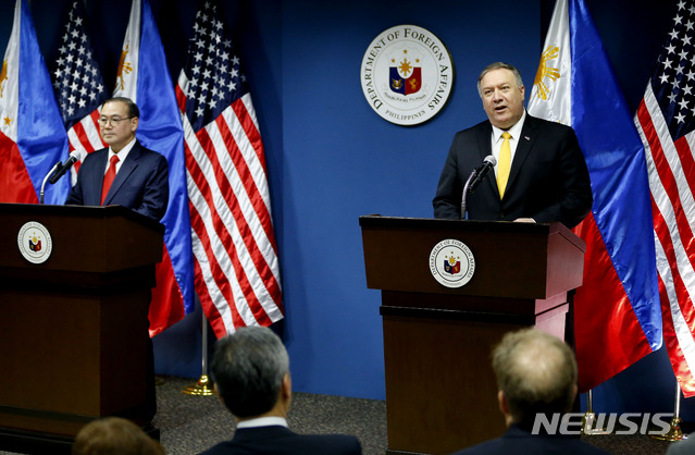 U.S. State Secretary Mike Pompeo, right, answers question during his joint news conference with Philippine Foreign Affairs Secretary Teodoro Locsin Jr. in suburban Pasay city southeast of Manila, Philippines Friday, March 1, 2019. Pompeo, who joined U.S. President Donald Trump in the second summit with North Korean leader Kim Jong-un in Vietnam, is here for talks on the two countries&#039; relations as well as the mutual defense treaty. (AP Photo/Bullit Marquez)