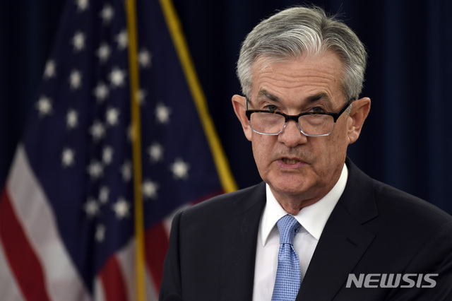 Federal Reserve Chair Jerome Powell speaks during a news conference in Washington, Wednesday, March 20, 2019. The Federal Reserve left its key interest rate unchanged Wednesday and projected no rate hikes in 2019, dramatically underscoring its plan to be &quot;patient&quot; about any further increases. (AP Photo/Susan Walsh)