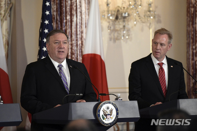 Secretary of State Mike Pompeo speaks as acting Secretary of Defense Patrick Shanahan listens on Friday, April 19, 2019, at the Department of State in Washington. (AP Photo/Sait Serkan Gurbuz)