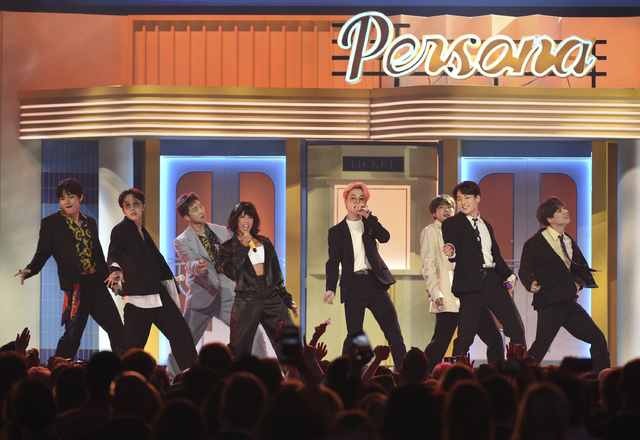 Halsey, fourth from left, and BTS perform "Boy With Luv" at the Billboard Music Awards on Wednesday, May 1, 2019, at the MGM Grand Garden Arena in Las Vegas. (Photo by Chris Pizzello/Invision/AP)